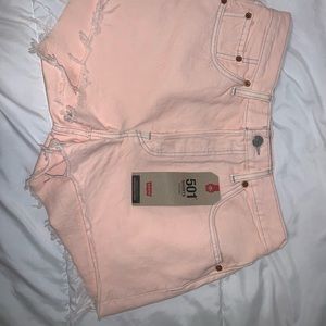 Levi’s neon orange shorts